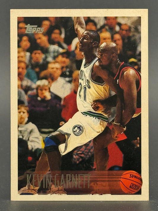 Kevin Garnett Topps basketball card, featuring Garnett in a Timberwolves uniform playing against an opponent.