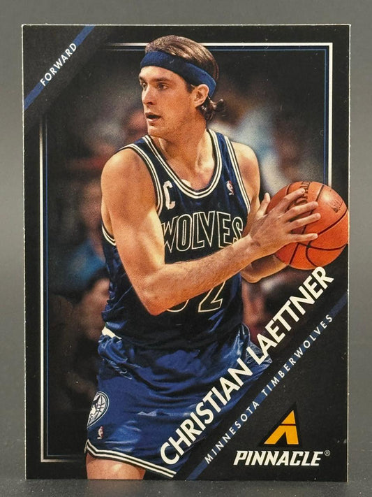Christian Laettner basketball trading card, Pinnacle, Minnesota Timberwolves, holding a basketball.