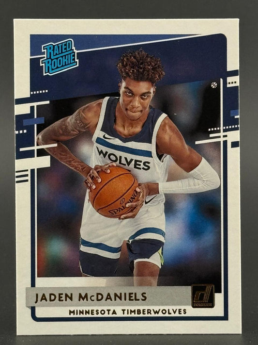 Jaden McDaniels 2020-21 Donruss Rated Rookie trading card holding a basketball.