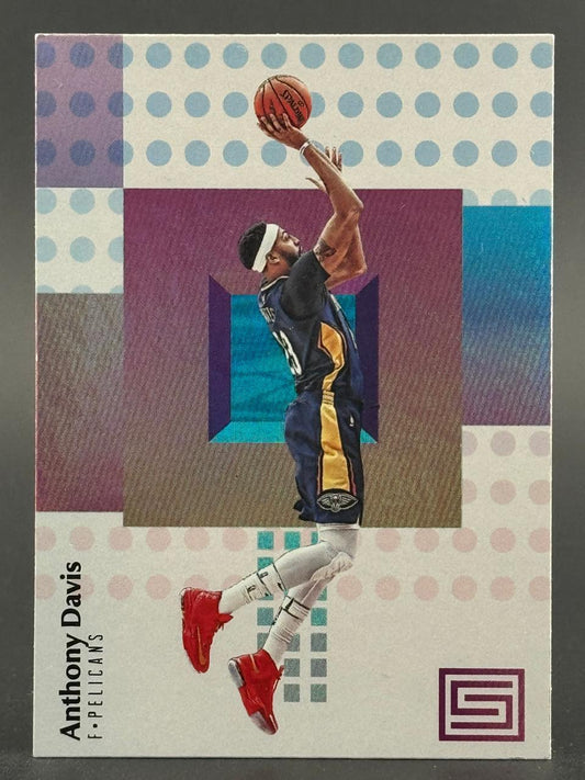 Anthony Davis Pelicans trading card with geometric polka-dot background.