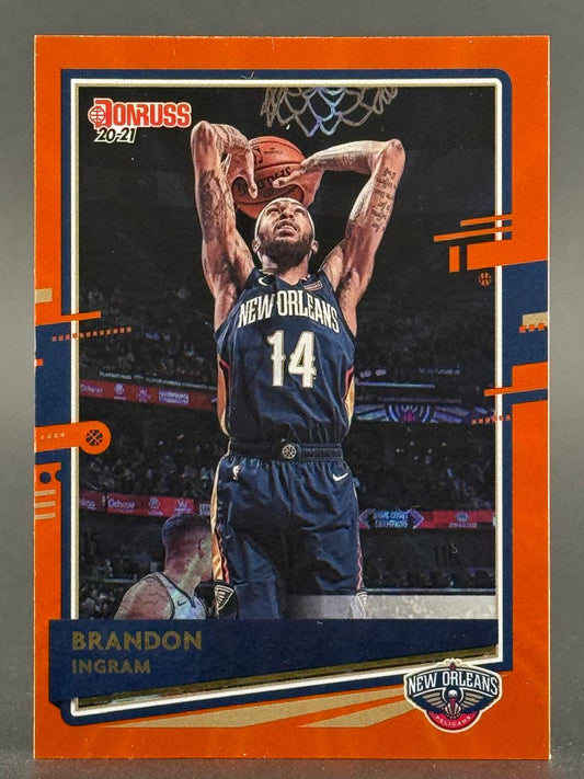 20-21 Donruss Brandon Ingram trading card with orange border, showing him in a New Orleans jersey shooting.