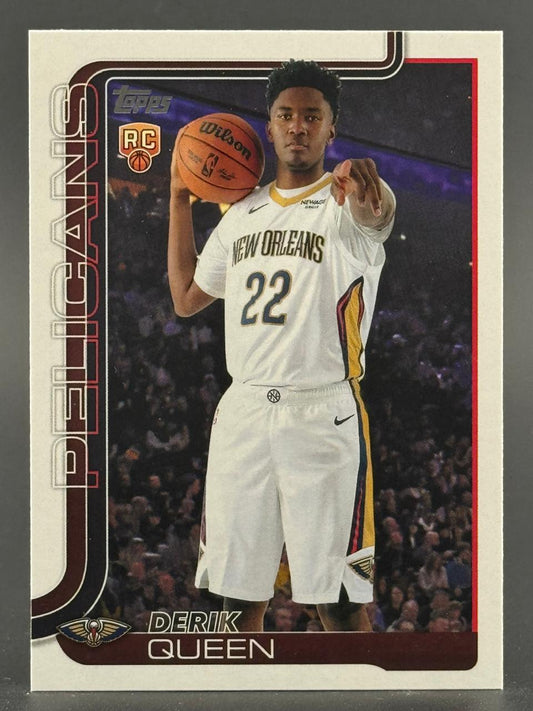 Topps trading card of Derik Queen in New Orleans Pelicans uniform, holding a basketball, pointing forward.