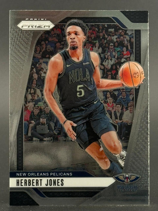 Panini Prizm trading card of Herbert Jones in a black New Orleans Pelicans uniform dribbling a basketball.