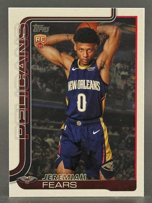 Jeremiah Fears Topps basketball rookie card showing him in a New Orleans jersey holding a ball.