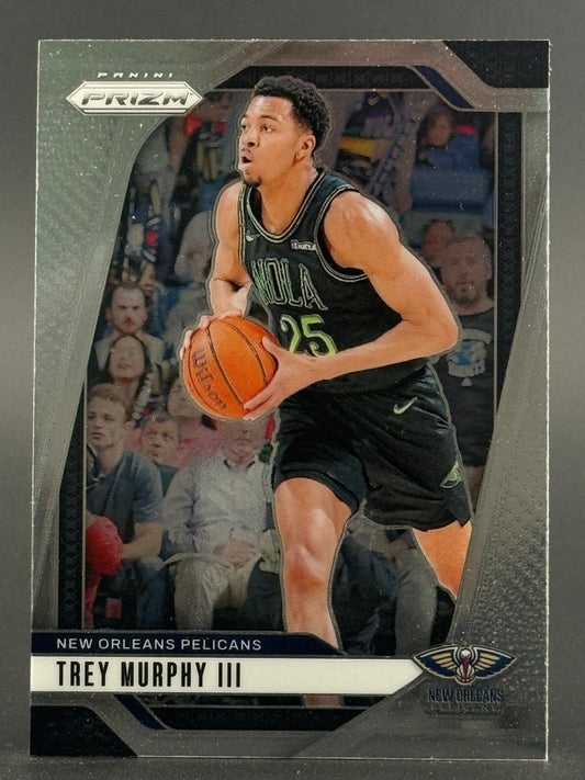 2021-22 Panini Prizm Trey Murphy III rookie card holding a basketball.