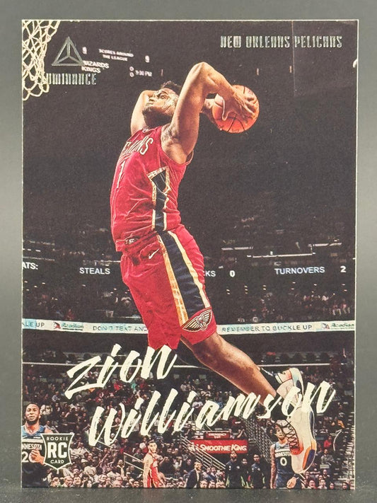 Zion Williamson 2019-20 Panini Luminance Rookie Card dunking in a red Pelicans uniform.