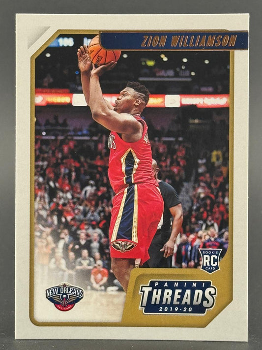 2019-20 Panini Threads Zion Williamson rookie basketball card, shooting a basketball in a red Pelicans uniform.