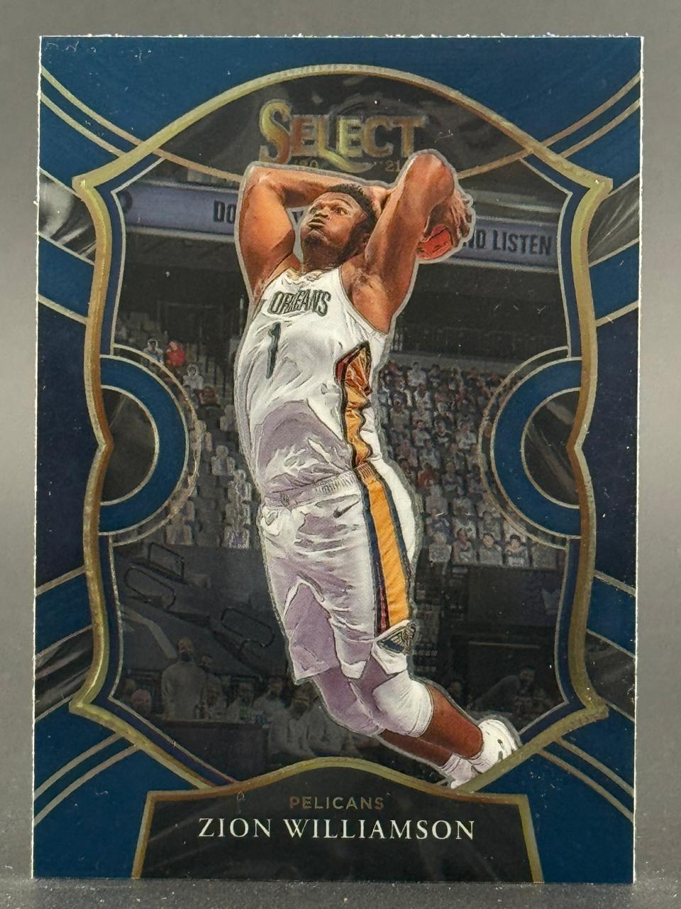 2020-21 Select Zion Williamson basketball card, showing him dunking in a Pelicans uniform.