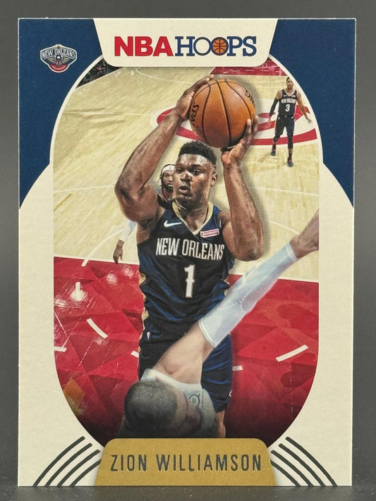 Zion Williamson 2019-20 NBA Hoops basketball card, showing him in a New Orleans Pelicans jersey holding a basketball.