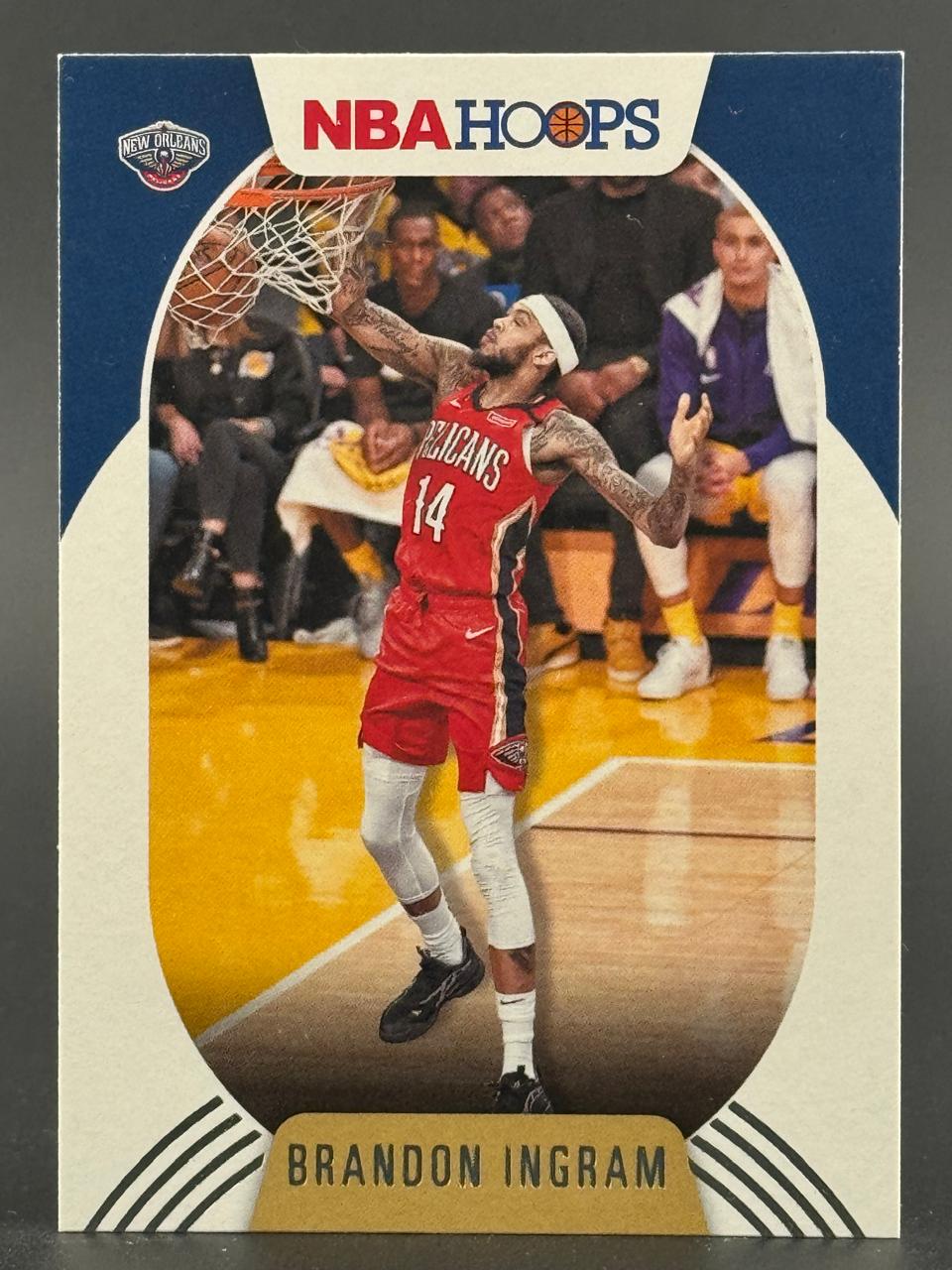 Brandon Ingram 2019-20 NBA Hoops basketball card, featuring Ingram in a Pelicans red uniform dunking.