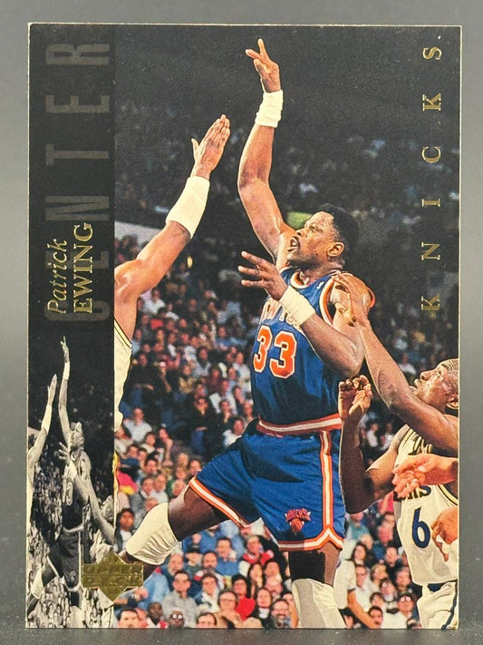 1990s Patrick Ewing New York Knicks trading card showing Ewing shooting over defenders.
