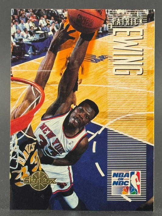 Patrick Ewing SkyBox basketball card featuring a slam dunk, with the player's name and NBA on NBC logo visible.