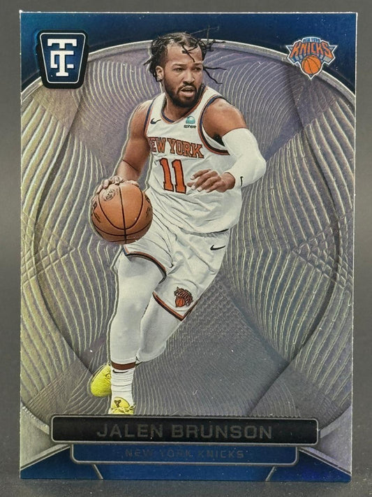 Jalen Brunson New York Knicks trading card with an abstract silver textured background.