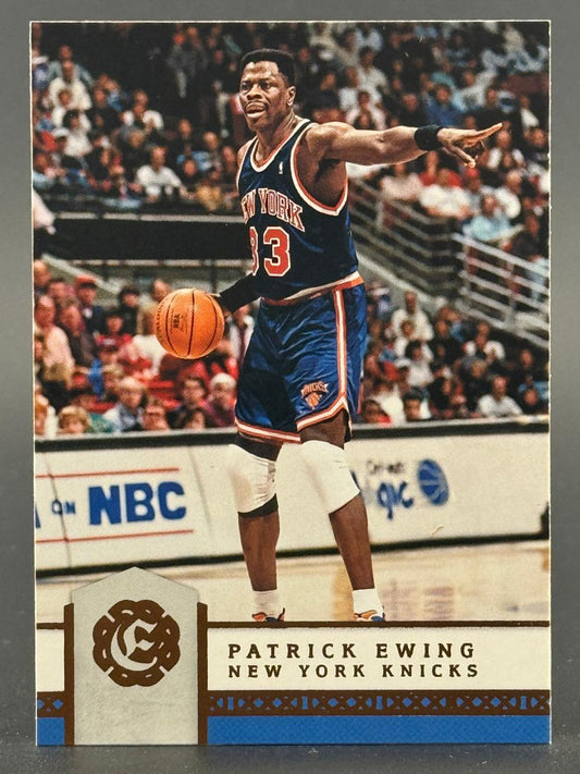 Trading card of Patrick Ewing of the New York Knicks dribbling a basketball on the court.
