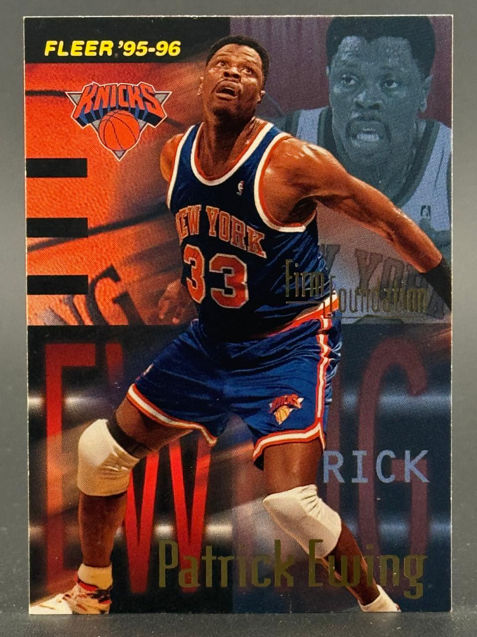 1995-96 Fleer Patrick Ewing trading card #33 in New York Knicks uniform.