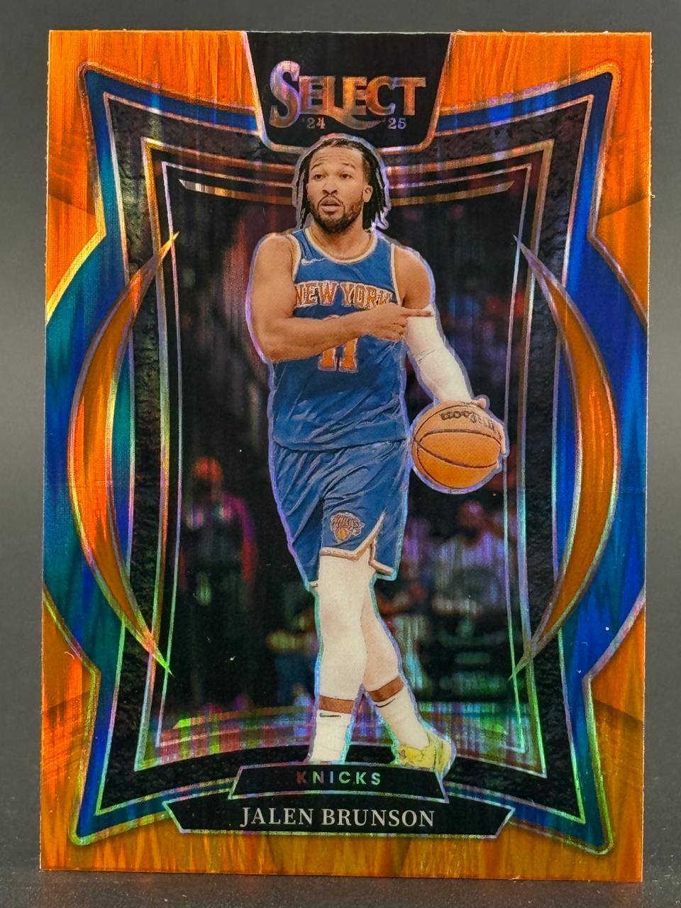2024-25 Select Jalen Brunson New York Knicks basketball card with an orange and blue refractor finish.