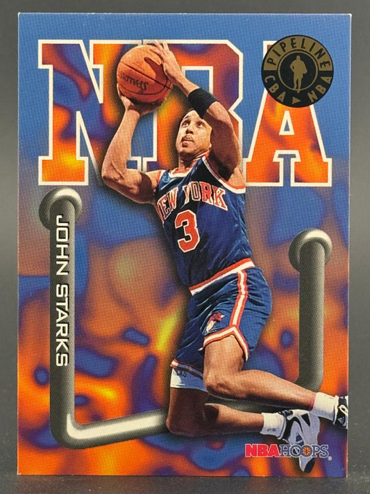 John Starks trading card featuring him in a New York Knicks uniform, holding a basketball.