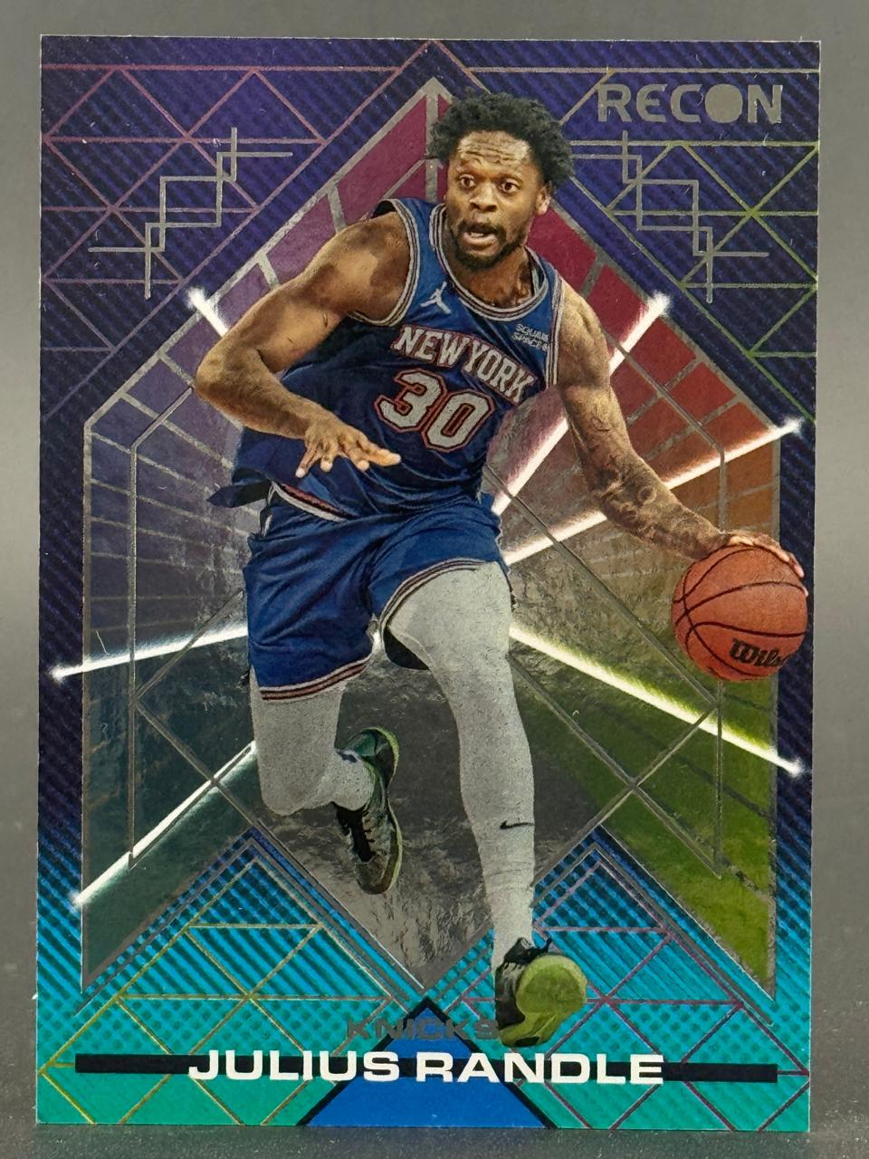 Julius Randle 2021-22 Panini Recon basketball card, featuring Randle dribbling in a Knicks uniform.