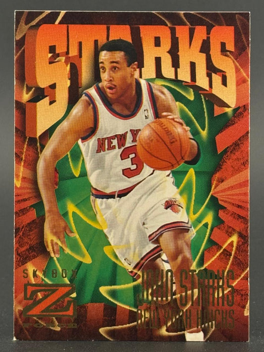 1990s SkyBox Z-Force John Starks basketball card with orange, green, and yellow background.