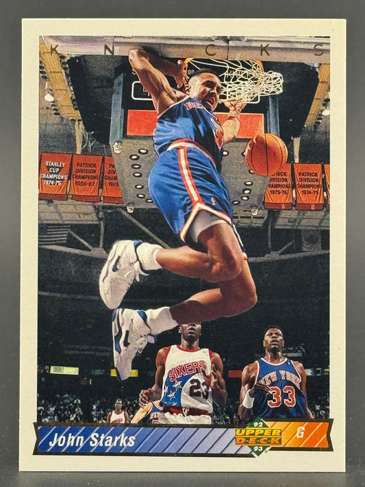 1992-93 Upper Deck John Starks basketball card featuring him dunking over opponents.