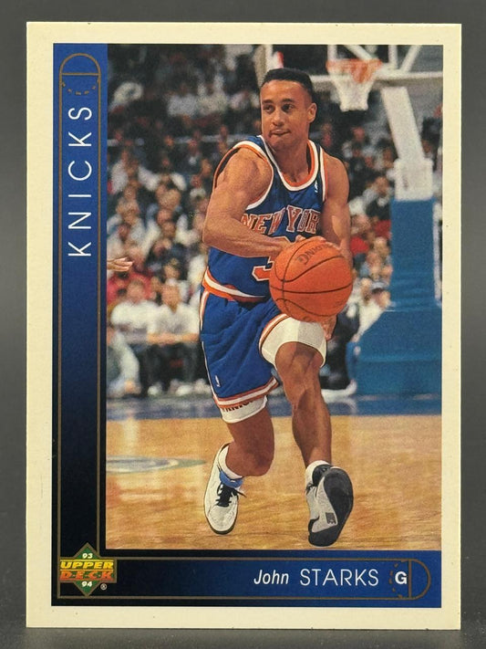 1993 Upper Deck John Starks basketball card featuring Starks dribbling in a Knicks uniform.