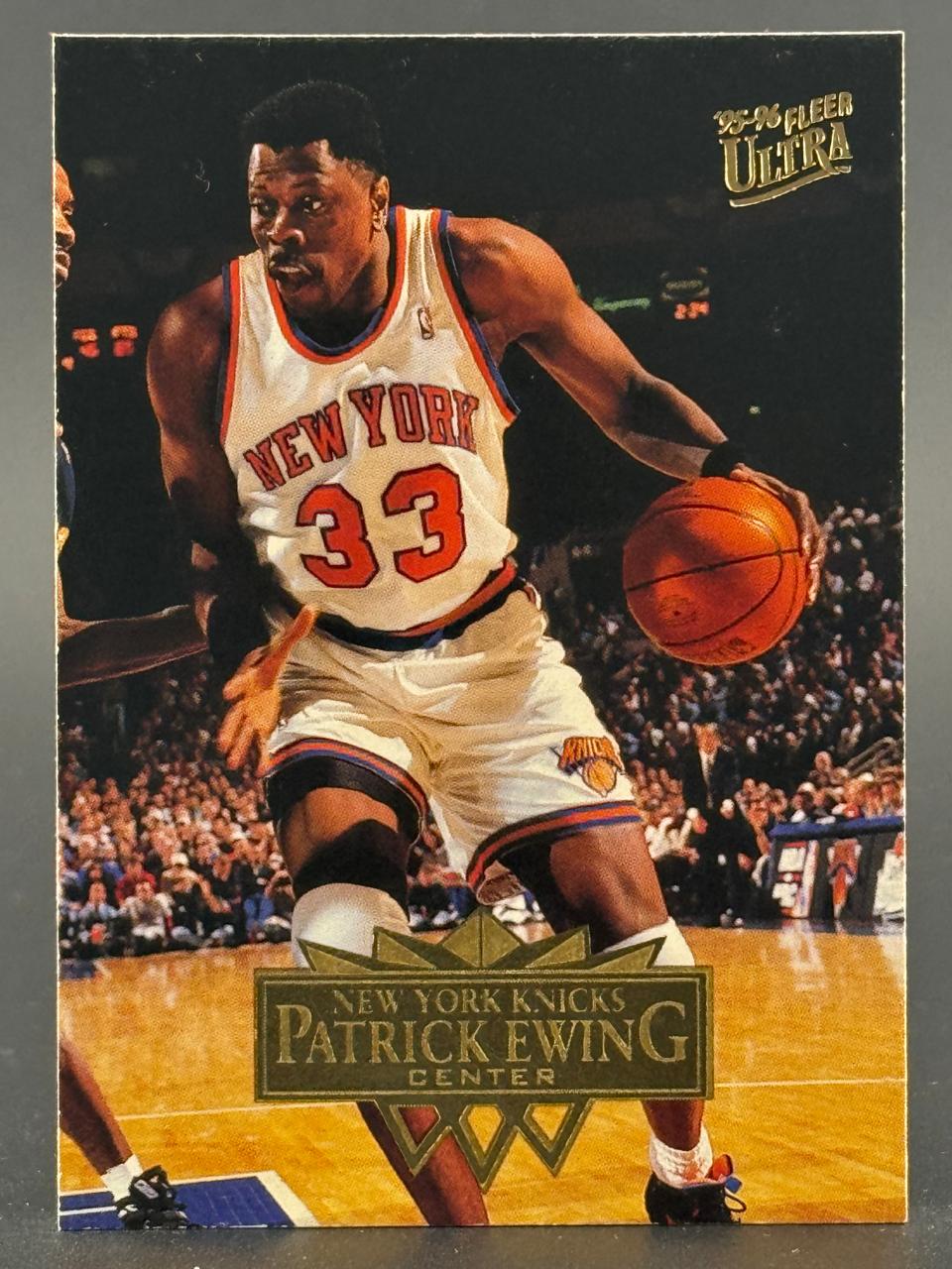 1995-96 Fleer Ultra Patrick Ewing trading card, #33, showing Ewing dribbling in a New York Knicks uniform.