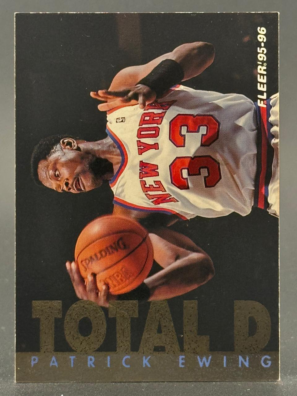 1995-96 Fleer Total D Patrick Ewing basketball card.