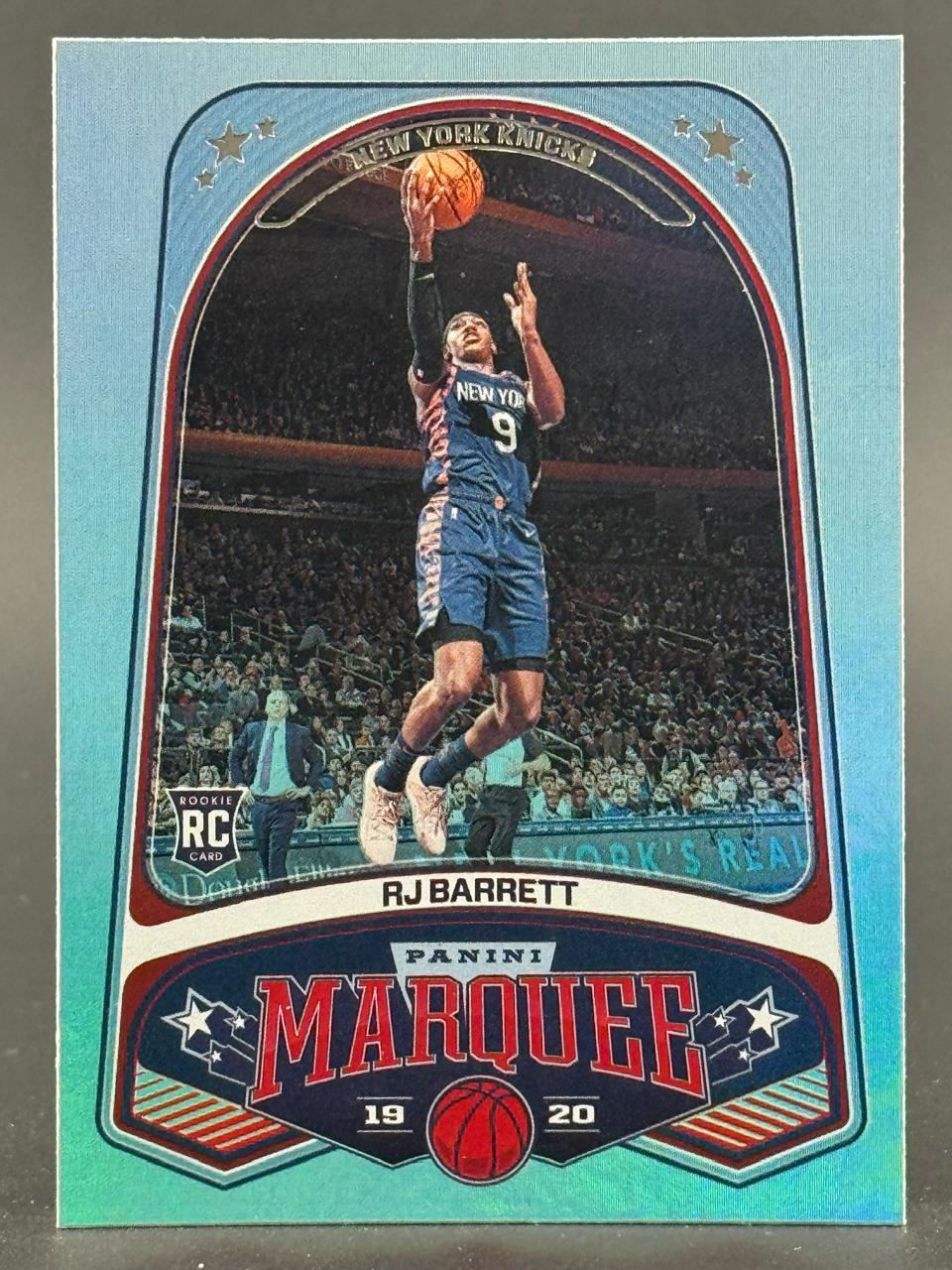 2019-20 Panini Marquee RJ Barrett rookie basketball card featuring him shooting in a Knicks uniform.