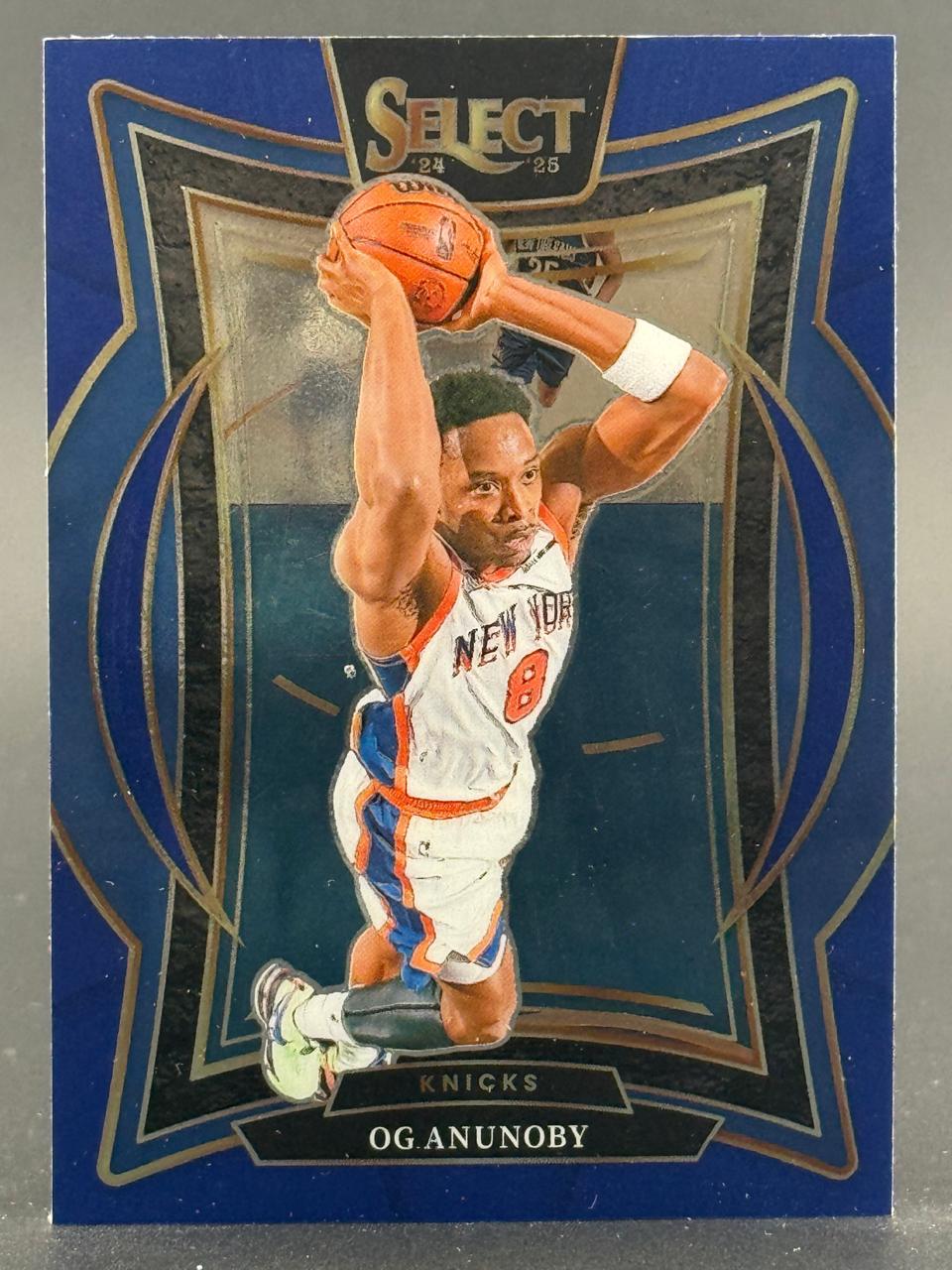24-25 Panini Select OG Anunoby New York Knicks basketball trading card holding a basketball.
