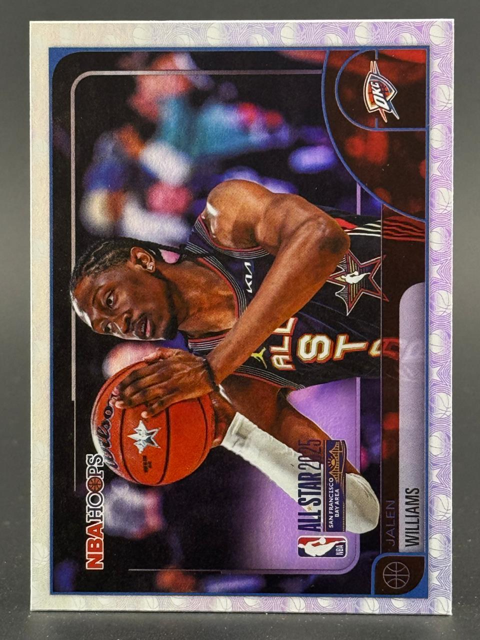 Jalen Williams on a 2024-25 NBA Hoops basketball card holding a basketball.