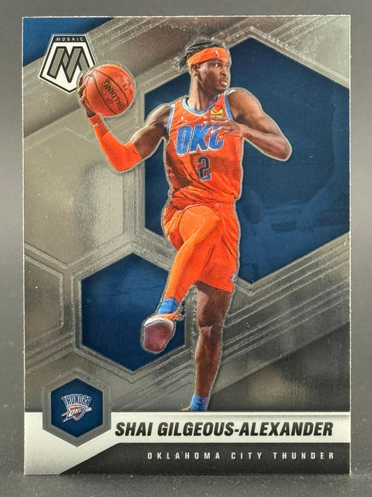 Shai Gilgeous-Alexander Mosaic basketball card holding a basketball in an orange Thunder uniform.