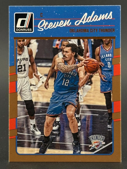 Steven Adams 2016-17 Donruss basketball card holding a basketball in uniform.
