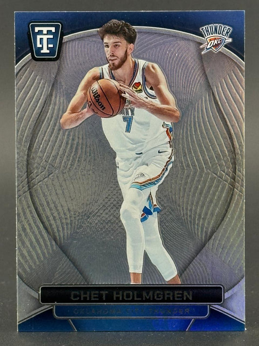 Chet Holmgren basketball trading card featuring him in his Oklahoma City Thunder uniform holding a basketball.