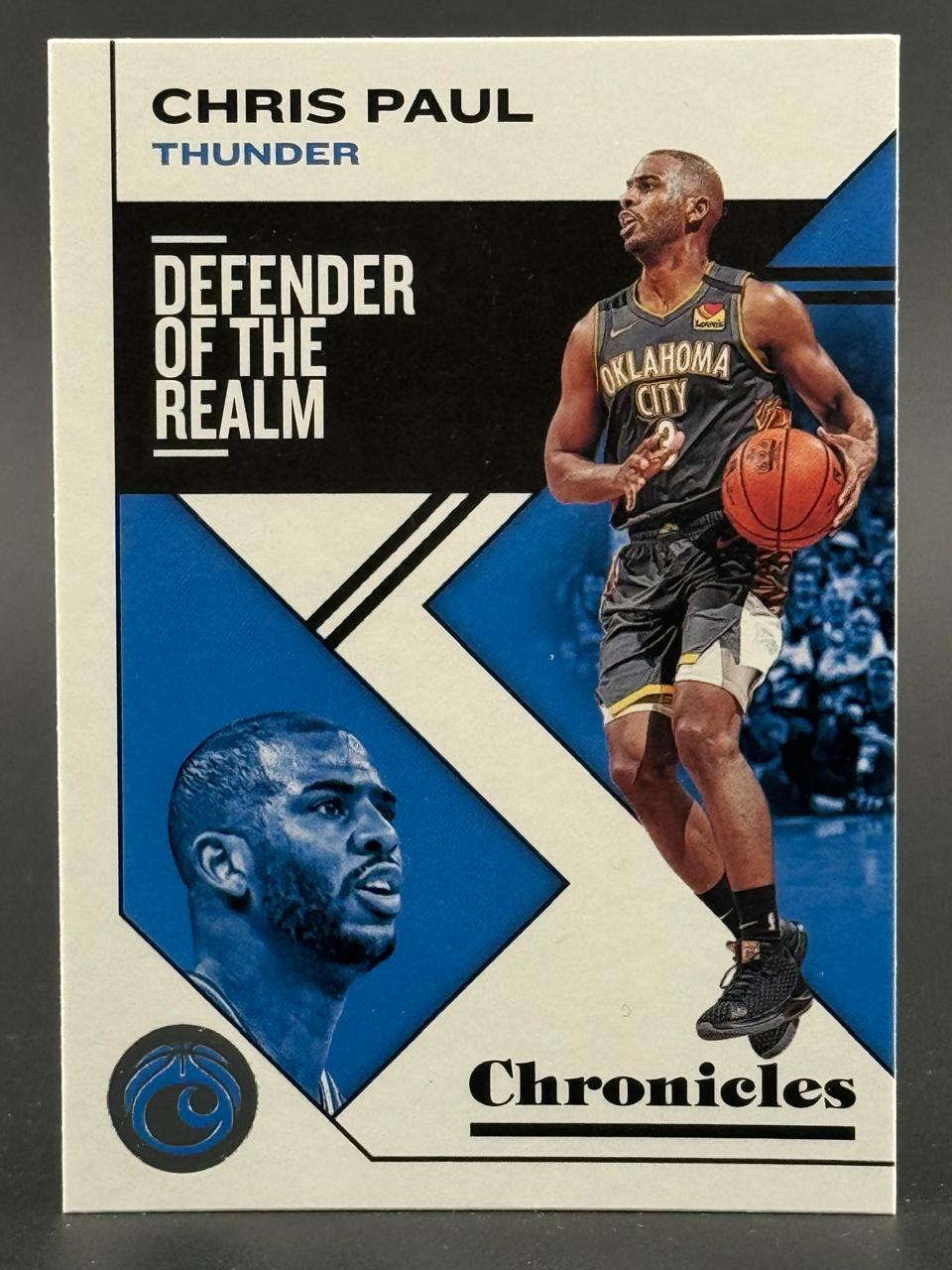 Trading card featuring Chris Paul of the Oklahoma City Thunder, from the Defender of the Realm insert in Chronicles.
