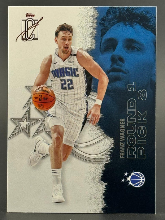 Franz Wagner trading card featuring him in an Orlando Magic uniform dribbling a basketball.