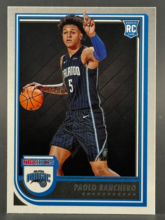 Paolo Banchero 2022-23 NBA Hoops Rookie Card with Magic uniform and basketball.