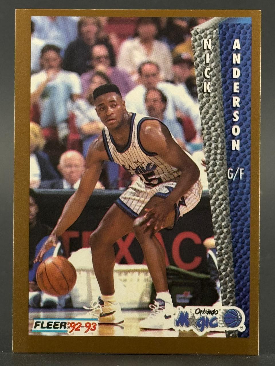 1992-93 Fleer Nick Anderson basketball card with player dribbling a basketball on court.