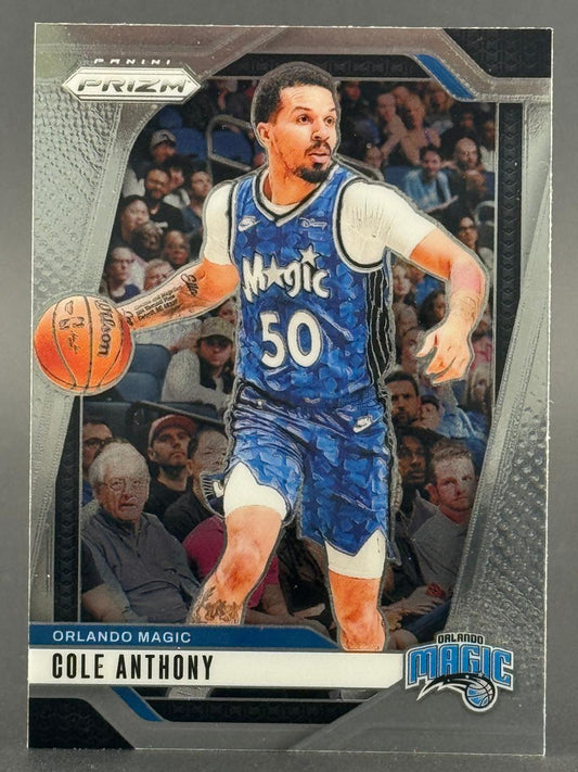 Panini Prizm trading card featuring Orlando Magic player Cole Anthony dribbling a basketball in a blue jersey.