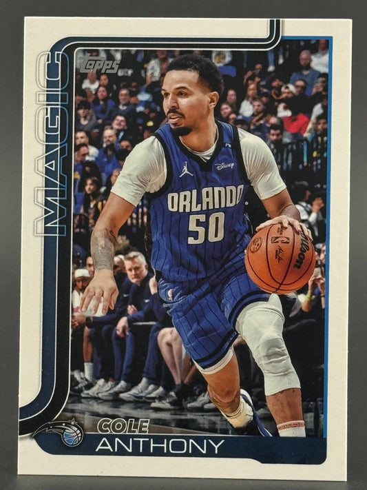 Cole Anthony basketball trading card featuring him dribbling in a blue Orlando Magic uniform.