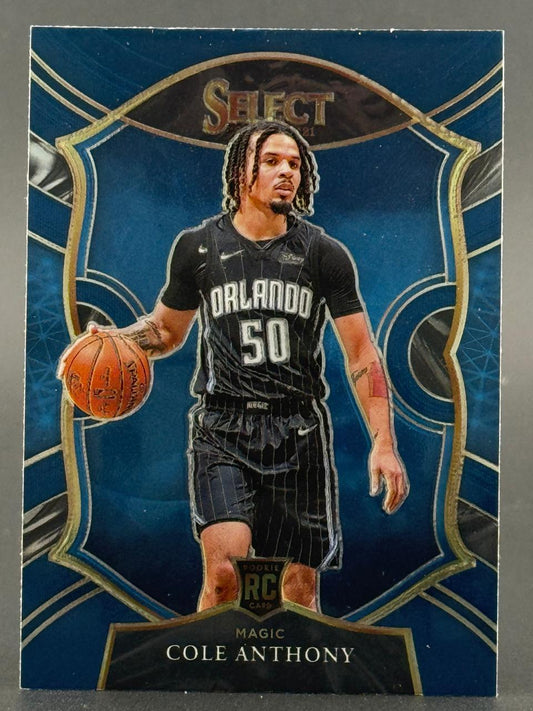 2020-21 Panini Select Cole Anthony #50 rookie card featuring him dribbling in an Orlando Magic uniform.