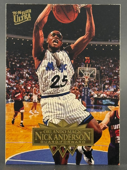 1995-96 Fleer Ultra Nick Anderson basketball card featuring him dunking in an Orlando Magic uniform.