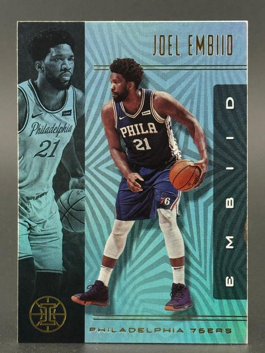 Joel Embiid basketball trading card featuring two images of the Philadelphia 76ers player holding a basketball.