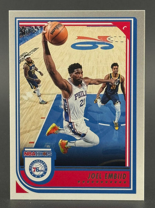 Joel Embiid 76ers basketball trading card with NBA Hoops logo.
