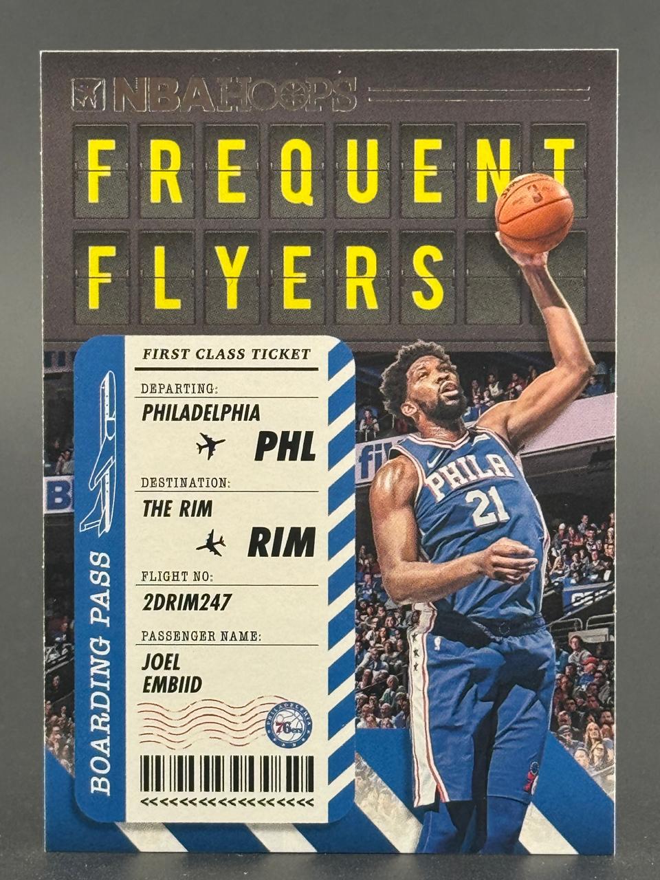 Joel Embiid 2020-21 NBA Hoops Frequent Flyers trading card featuring a boarding pass design.