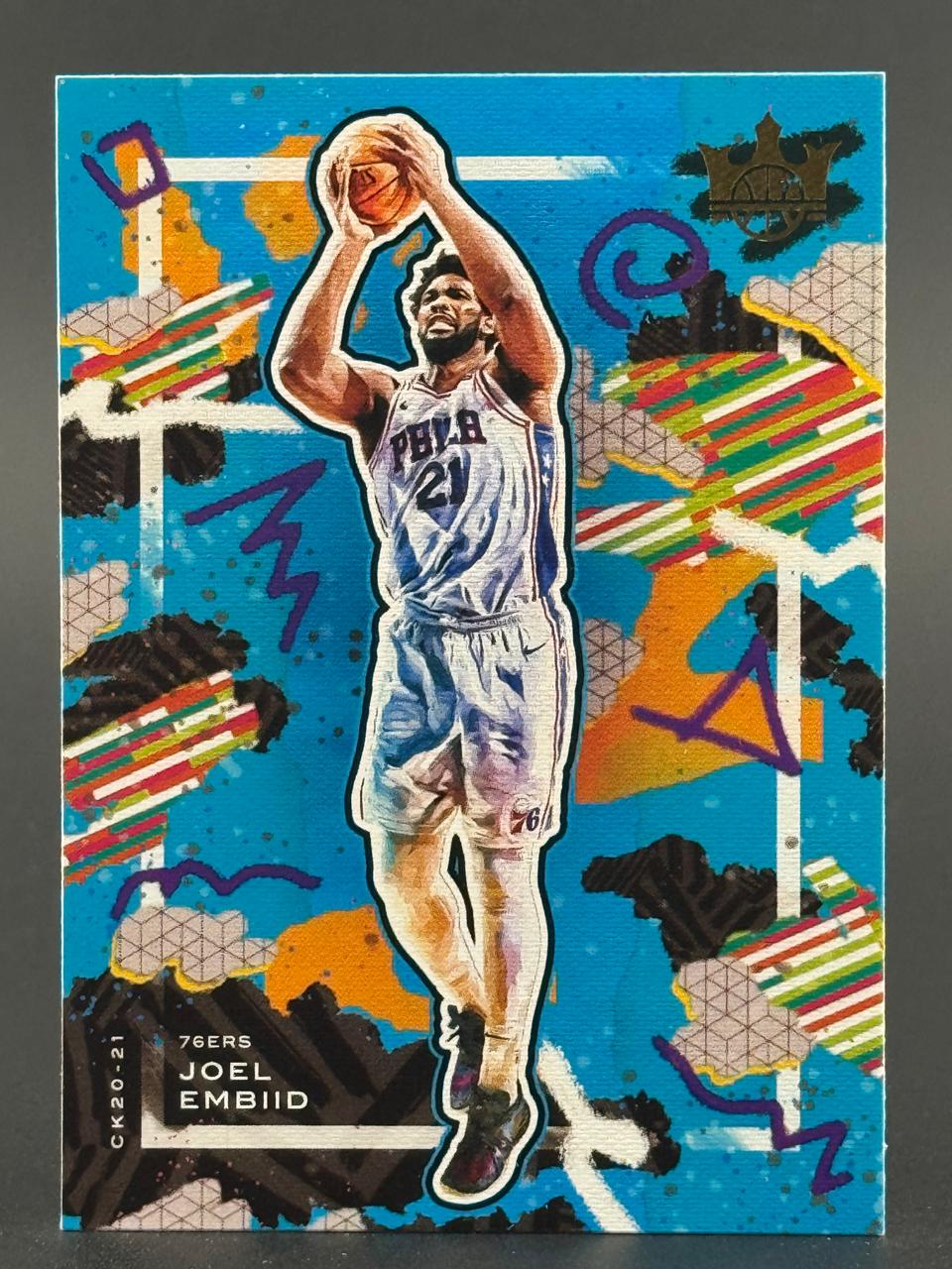 2020-21 Court Kings Joel Embiid 76ers basketball card with abstract colorful background.