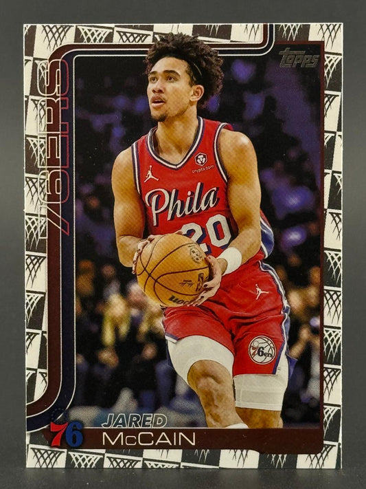 Jared McCain 2024 Topps trading card featuring the 76ers player holding a basketball.