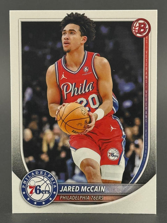 Jared McCain basketball card, Philadelphia 76ers, holding ball.