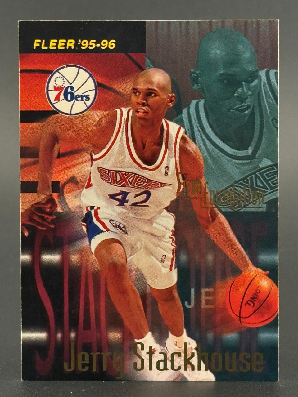 1995-96 Fleer Jerry Stackhouse 76ers basketball card dribbling.