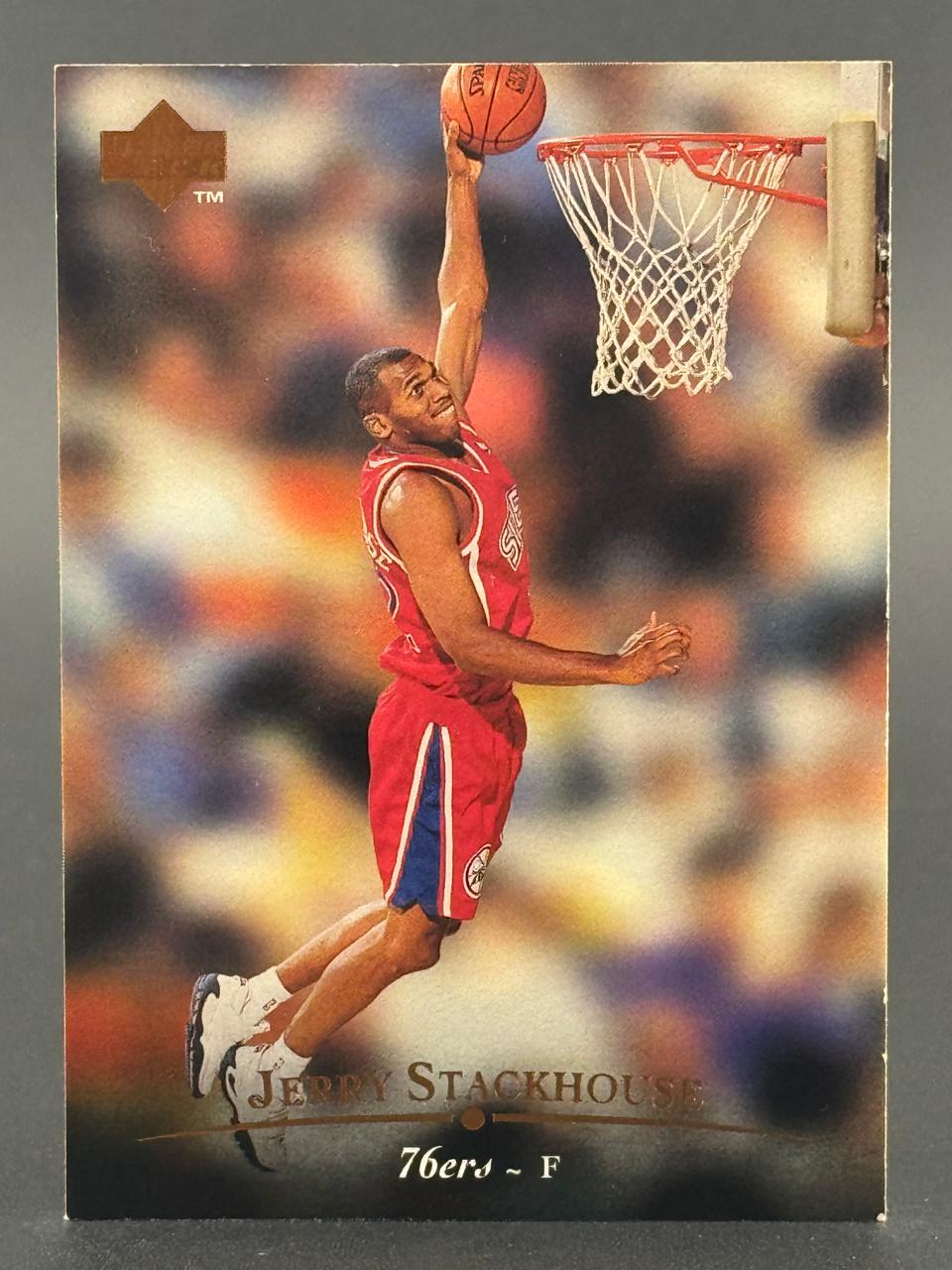 Jerry Stackhouse 76ers basketball trading card, showing him dunking.