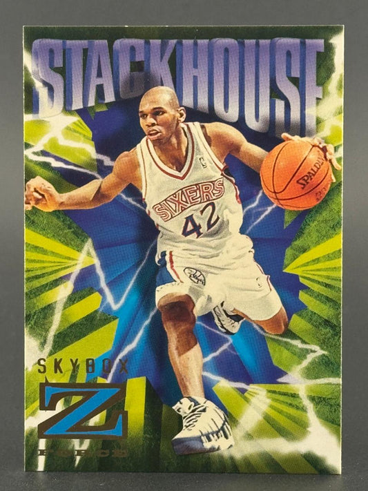 Jerry Stackhouse 1996-97 SkyBox Z-Force basketball card dribbling in a Sixers uniform.